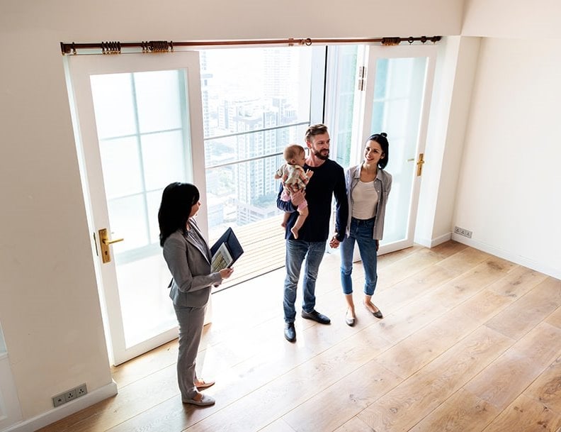 Realtor showing family a house